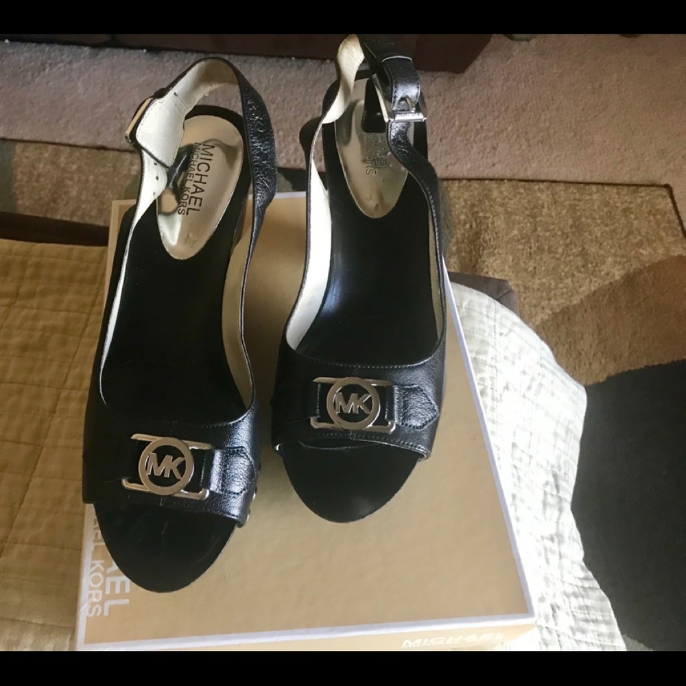 Michael Kors soft leather logo wedges.